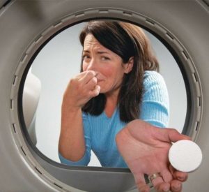 How to get rid of the smell in the washing machine - methods and causes