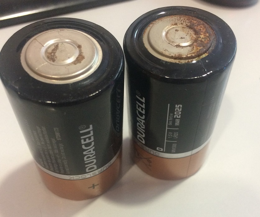 Batteries oxidized and began to rust