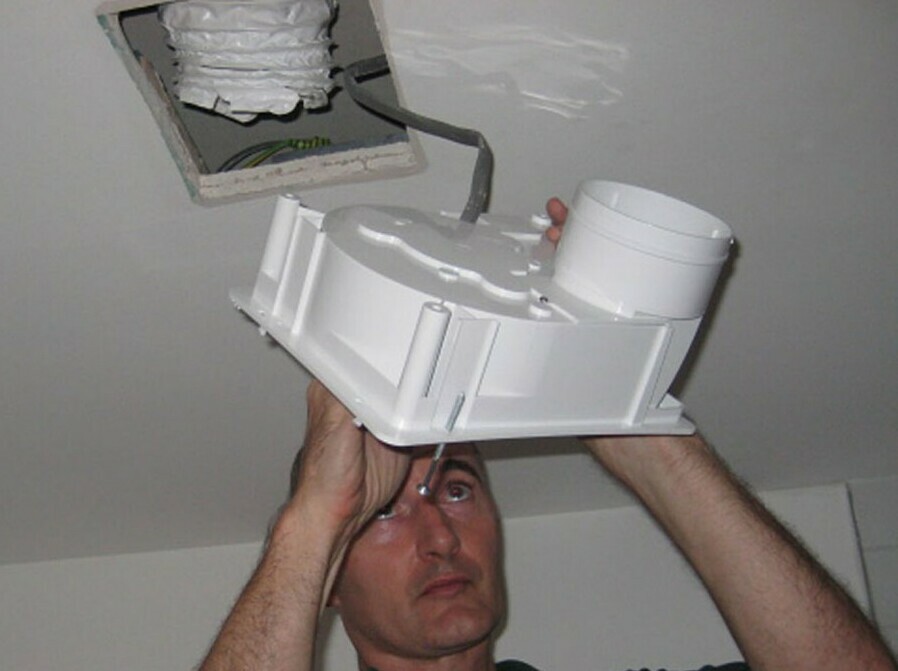 Ventilation in the bathroom in the ceiling: design features and instructions for installing the hood