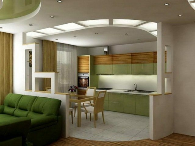 Enkelt moderne køkken kombineret med en stue