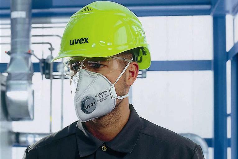 Construction worker in respirator