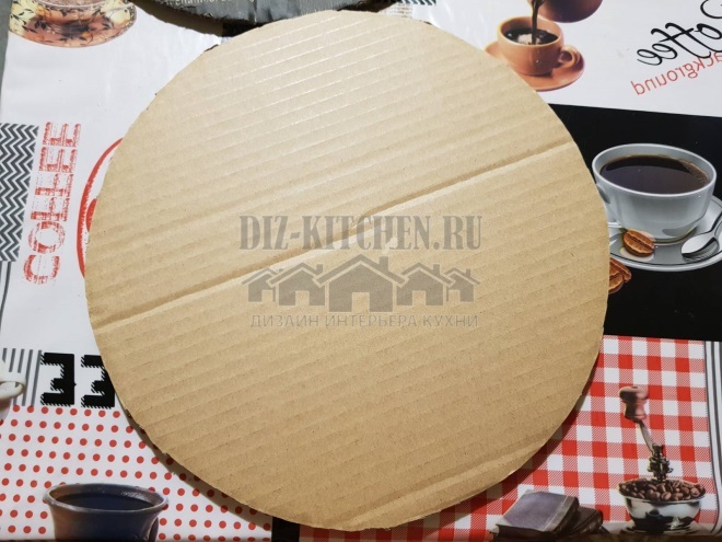 Cutting a circle out of cardboard