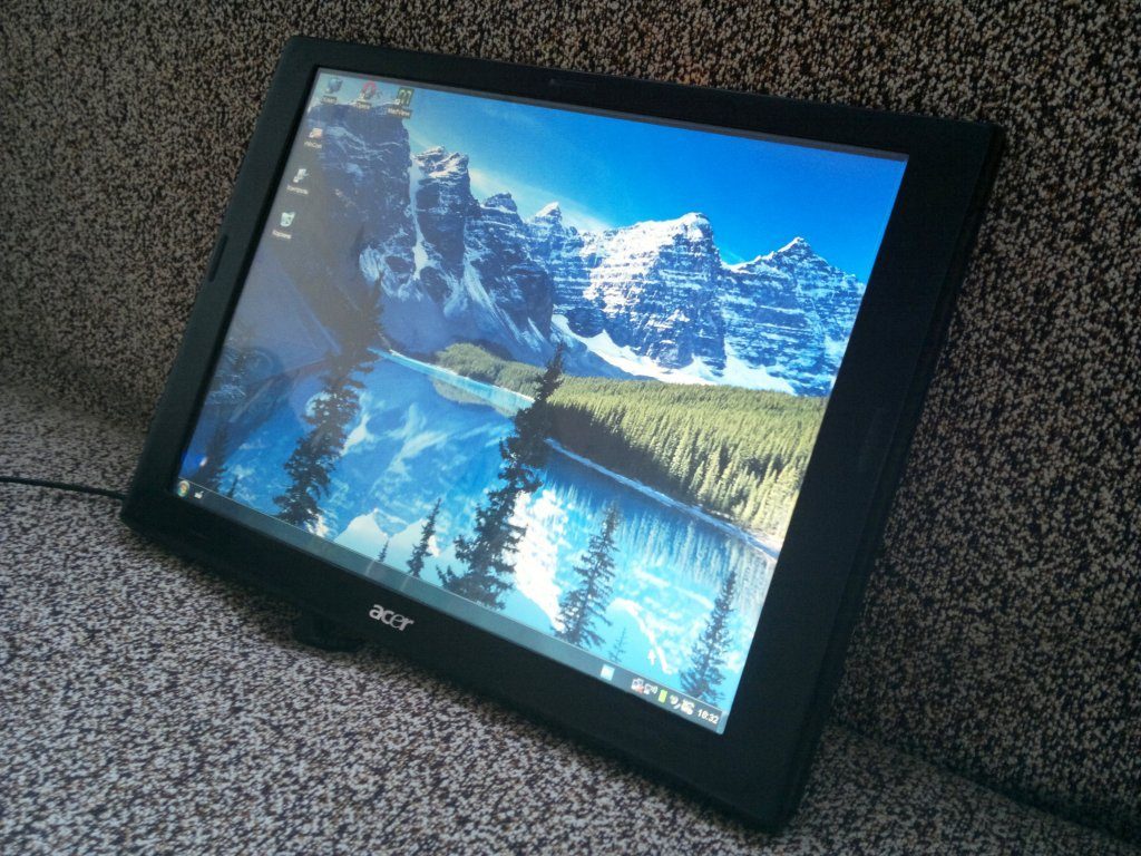 O tablet da tela do monitor.