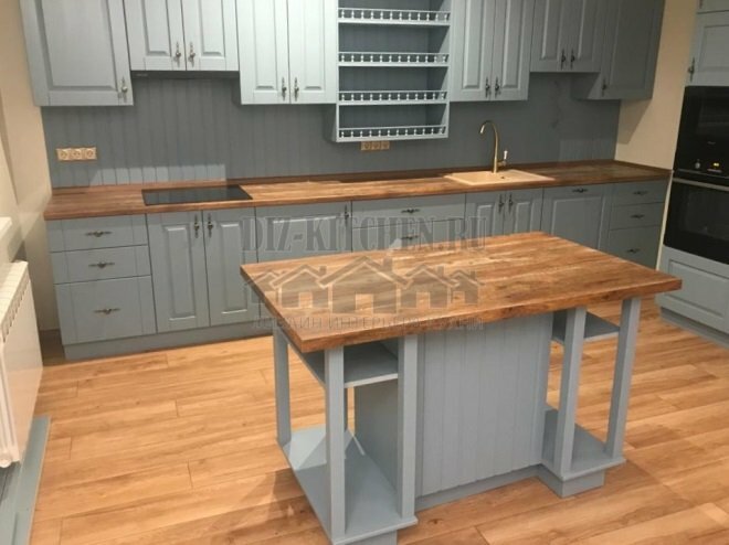 Monochrome blue classic kitchen with oak countertop