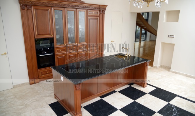 Classic solid wood kitchen with island in a country house