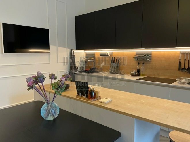 Modern gray and black kitchen with island