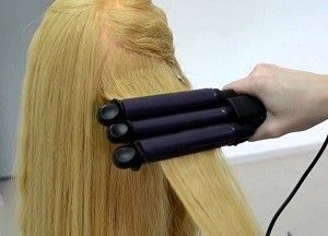 arricciatura Triple può sia curl e raddrizzare i capelli.