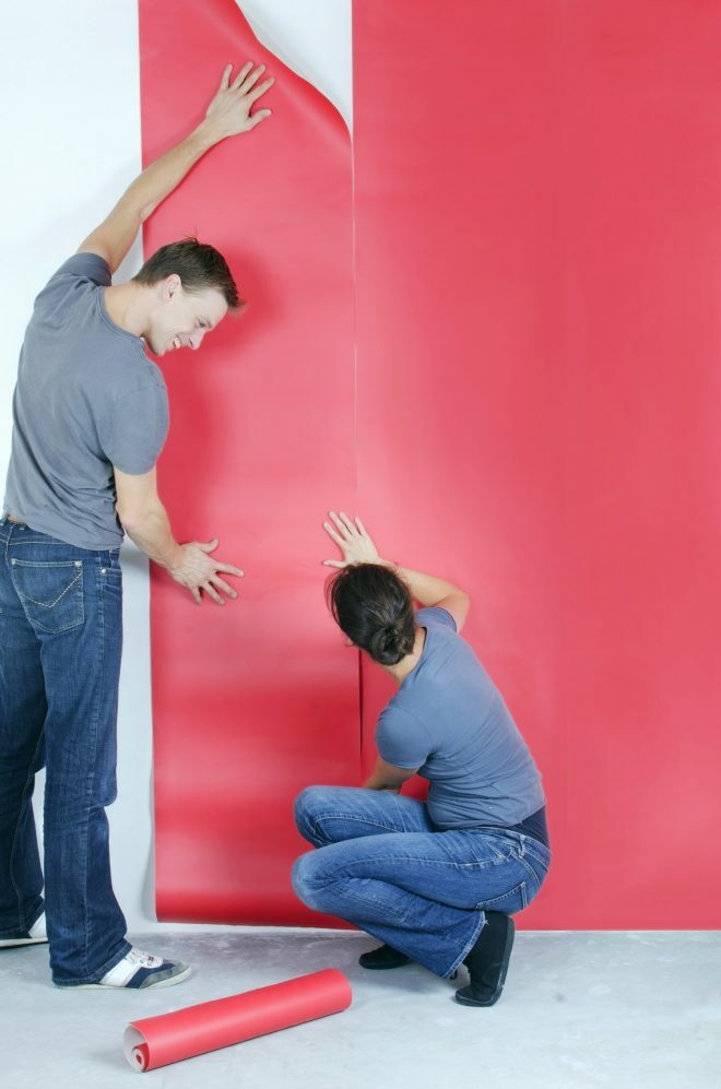 Pasting wallpaper on the wall