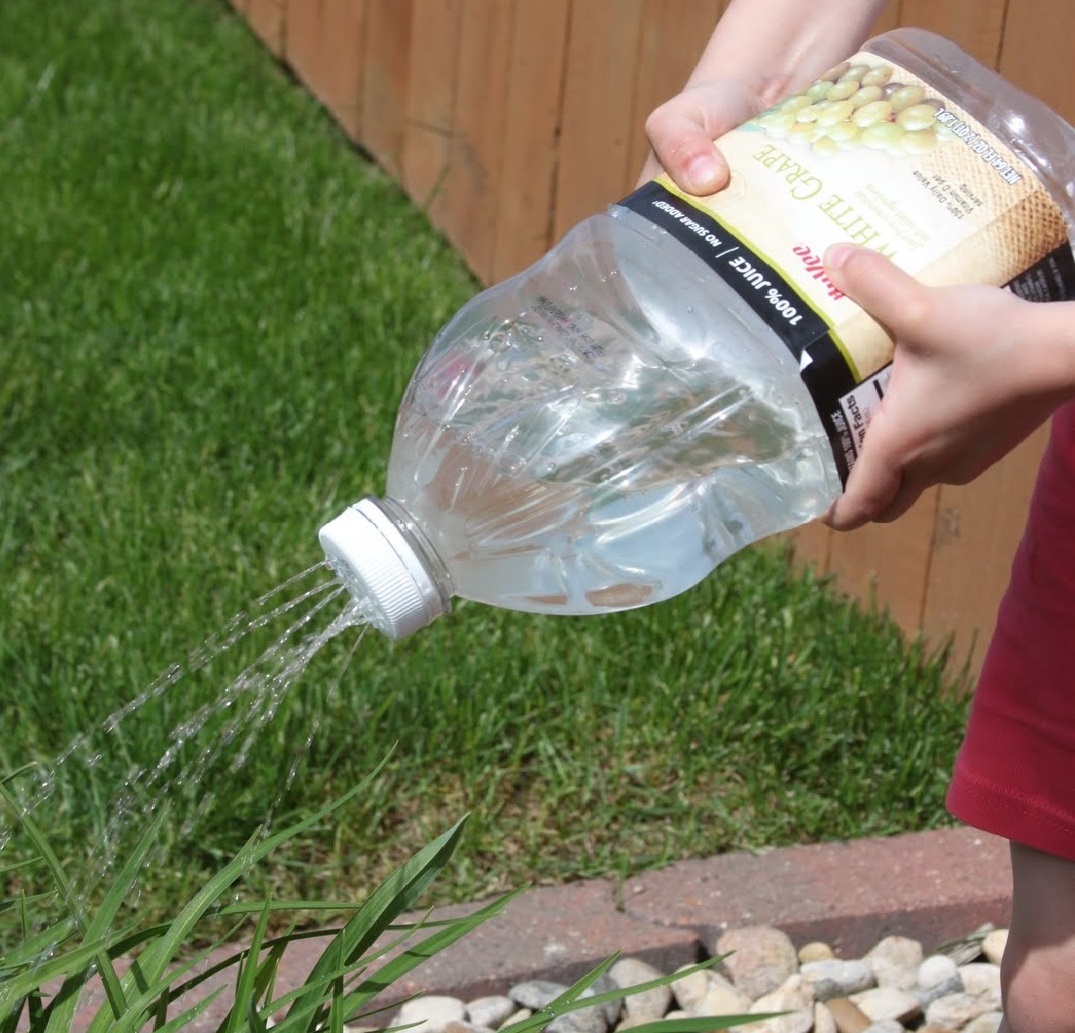 How to make a watering can with your own hands from a canister and a bottle