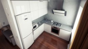 Mažoje virtuvėje įmontuotas šaldytuvas