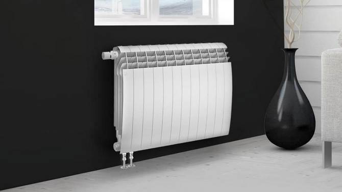Bottom connection radiators: aesthetics, energy efficiency, innovation