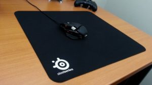 How can I replace the mouse pad? Why is it important to have a mat