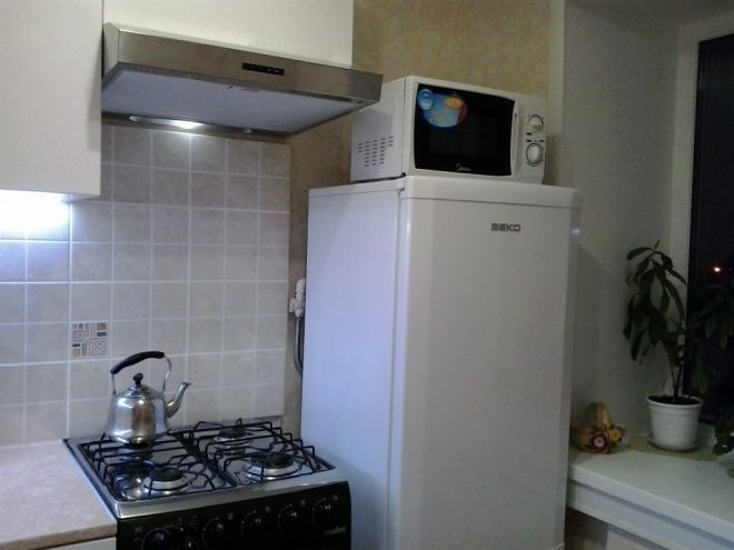Microwave on the fridge