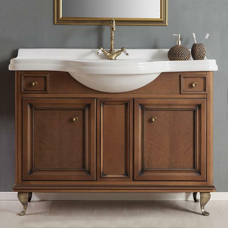 Cabinet with a sink in the bathroom.