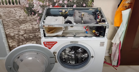 hogyan távolítsuk el a tömítést az LG mosógépről - 15