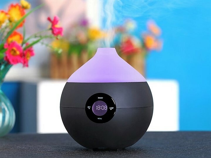 Small ultrasonic humidifier on the table