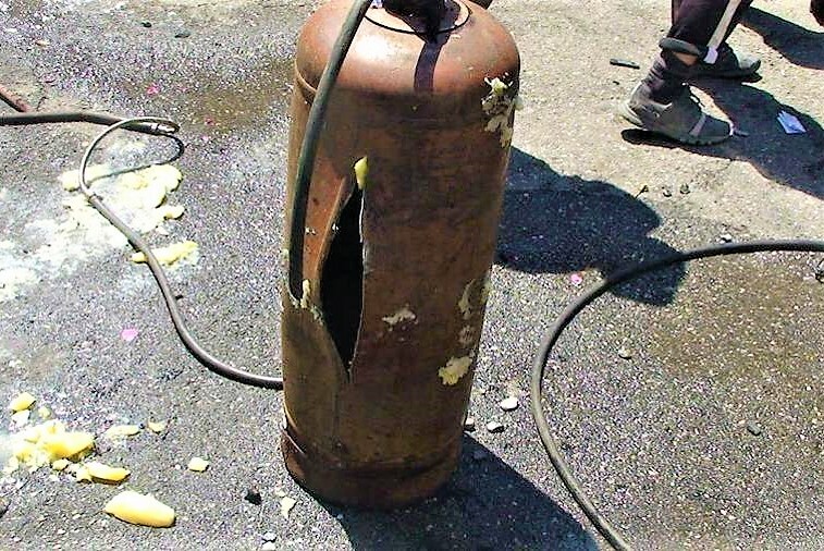Exploded gas cylinder