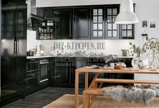 Classic black kitchen combined with living room