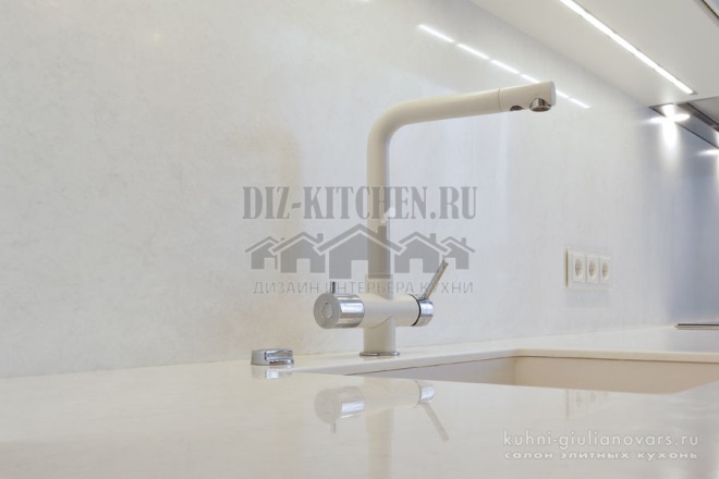 White faucet with water filter