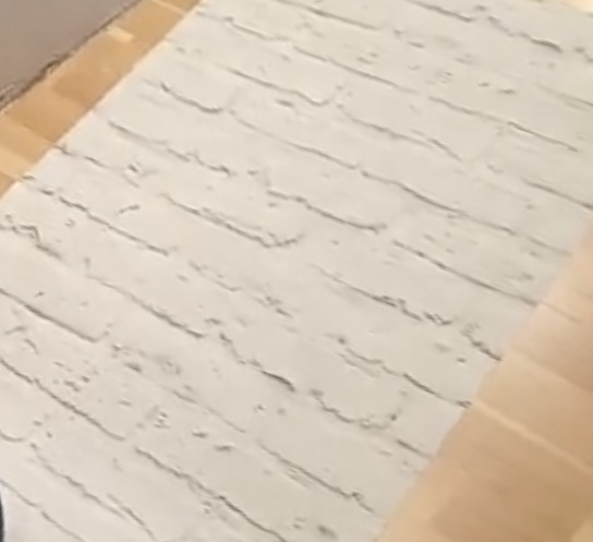 Papier peint intissé pour brique