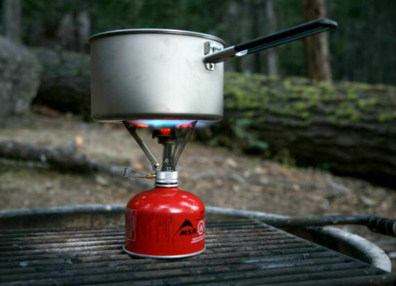 Gas cylinder with burner