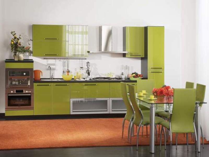The combination of olive and orange in the kitchen