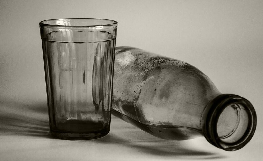 Glass and milk bottle