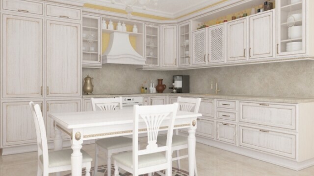 foto av ett vitt kök i interiören
