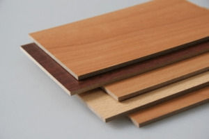 What kind of laminated chipboard material, where is it used and how safe is it?