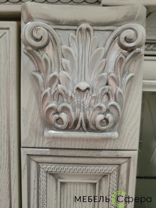 Small capital on a pilaster