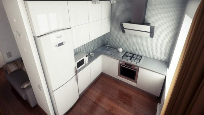 Pienessä keittiössä sisäänrakennettu jääkaappi